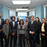Senator the Honourable Paula Gopee-Scoon, Minister of Trade and Industry, at center, accompanied by Permanent Secretary in the Ministry of Trade and Industry Randall Karim (right), Permanent Secretary in the Ministry of Digital Transformation, Cory Belfon (second from left), and representatives of Crimson Logic, Trinidad Tourism Limited, and the Trade Licence and TTBizLink units of the Ministry of Trade and Industry.