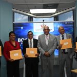 Senator the Honourable Satyakama Maharaj, Minister of Trade, Investment and Tourism (third from right); Mr. Edwin Chariah, EXIMBANK Chairman (third from left); Mr. Suresh Maharaj, Deputy Chairman (second from right); Ms. Nandini Narine, Director (second from left); Dr. Bhushan Singh, Director (right); and Mr. Joseph Ridge Paul, Director (left).