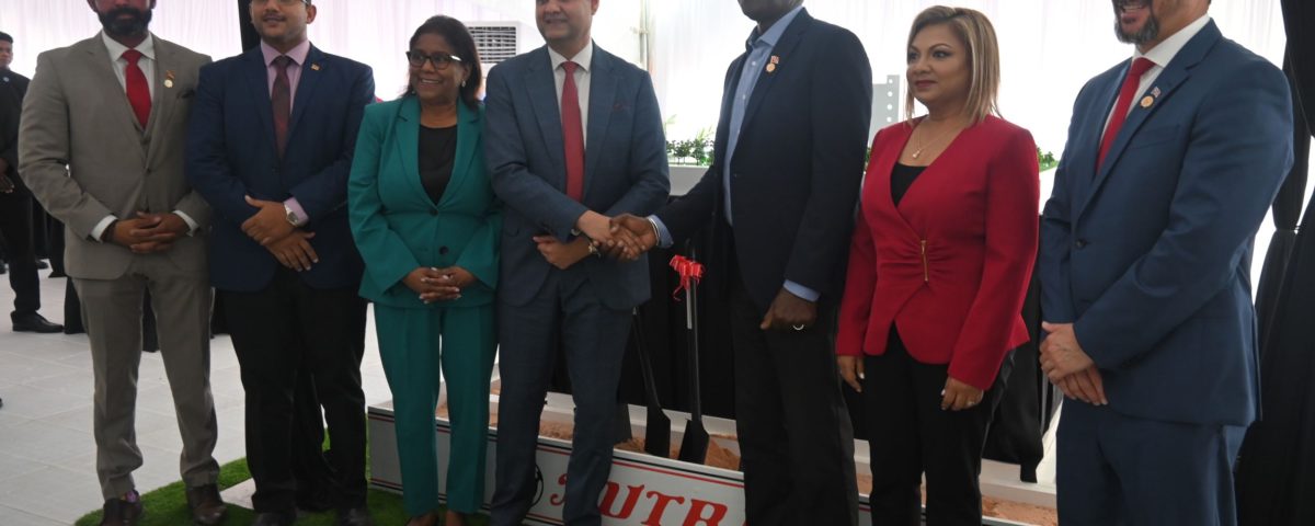 Nutrimix Sod turning Ceremony. Prime Minister Keith Rowley shakes hands with Mr. Ronnie Mohammed, CEO of the Nutrimix Group of Companies, alongside (from left to right) Senator the Hon. Richie Sookhai, Minister in the Ministry of Works and Transport; Senator the Hon. Avinash G. Singh, Minister in the Ministry of Agriculture, Land and Fisheries; Senator the Hon. Paula Gopee-Scoon, Minister of Trade and Industry; Mrs. Mohammed Director, Nutrimix Group of Companies, and Hon. Stuart Young S.C., Minister of Energy and Energy Industries and Minister in the Office of the Prime Minister