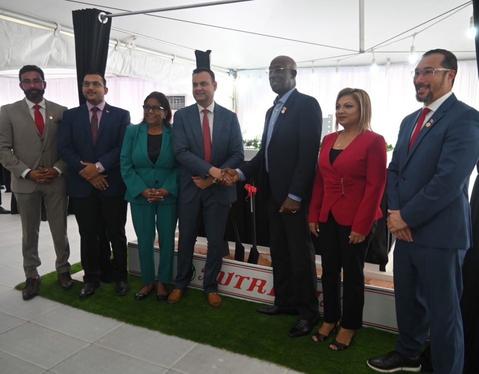 Nutrimix Sod turning Ceremony. Prime Minister Keith Rowley shakes hands with Mr. Ronnie Mohammed, CEO of the Nutrimix Group of Companies, alongside (from left to right) Senator the Hon. Richie Sookhai, Minister in the Ministry of Works and Transport; Senator the Hon. Avinash G. Singh, Minister in the Ministry of Agriculture, Land and Fisheries; Senator the Hon. Paula Gopee-Scoon, Minister of Trade and Industry; Mrs. Mohammed Director, Nutrimix Group of Companies, and Hon. Stuart Young S.C., Minister of Energy and Energy Industries and Minister in the Office of the Prime Minister