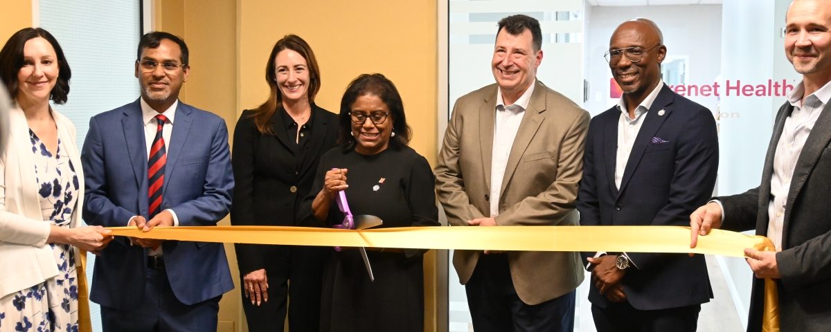 Minister Gopee-Scoon cuts ribbon at the opening of Carenet Health TT's office at Albion Plaza, Port of Spain
