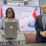 Minister of Trade and Industry, the Hon. Paula Gopee-Scoon and His Excellency Hernán Núñez Montenegro, Ambassador Extraordinary and Plenipotentiary of Chile to Trinidad and Tobago at the signing of a new Partial Scope Trade Agreement (PSTA) with the Republic of Chile at the Ministry's Head office in Port of Spain.