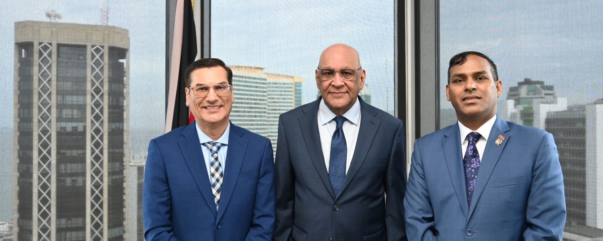 Minister of Trade, Investment and Tourism, Senator the Honourable Satyakama Maharaj (center) with Parliamentary Secretary Dr. Gosein (left), and Permanent Secretary Randall Karim