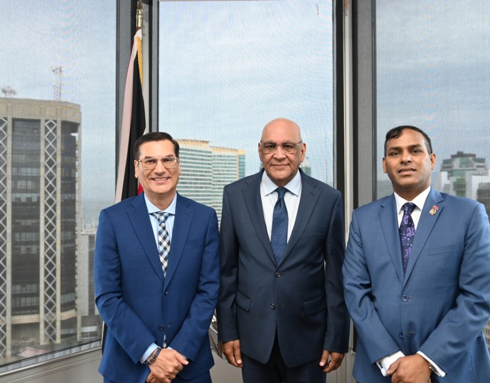 Minister of Trade, Investment and Tourism, Senator the Honourable Satyakama Maharaj (center) with Parliamentary Secretary Dr. Gosein (left), and Permanent Secretary Randall Karim