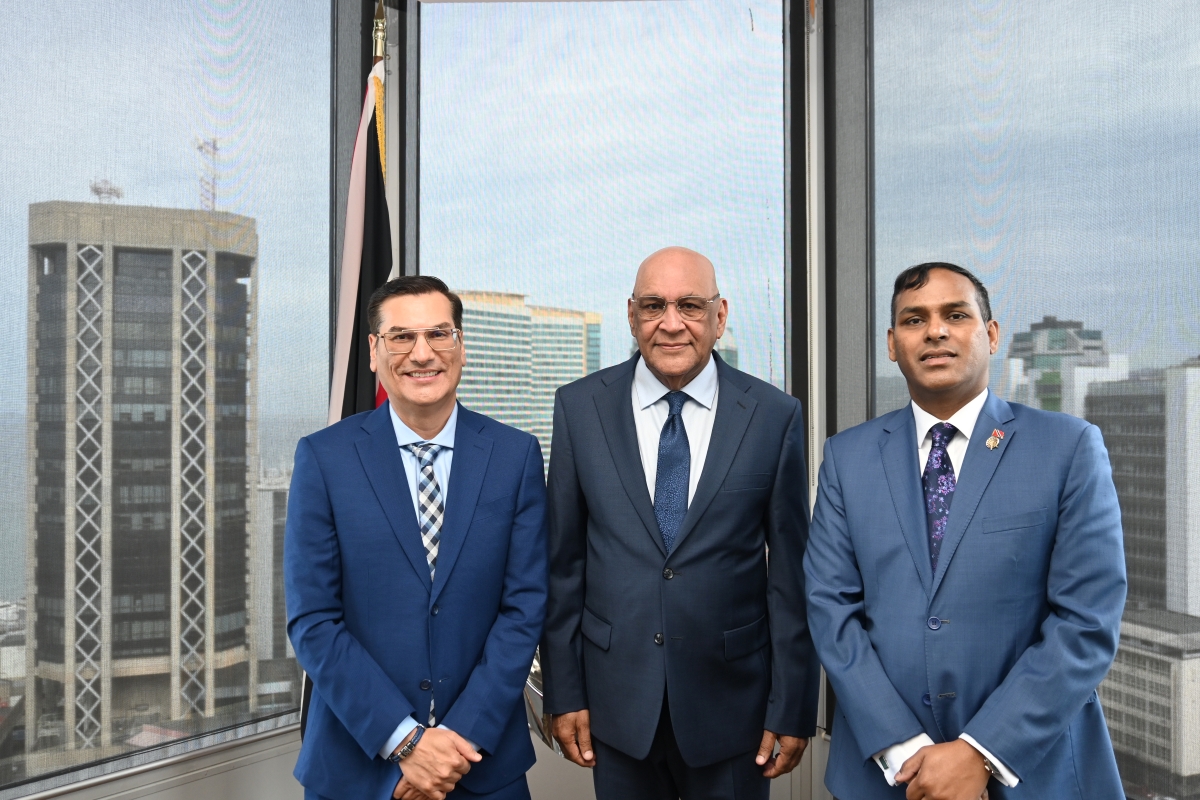 Minister of Trade, Investment and Tourism, Senator the Honourable Satyakama Maharaj (center) with Parliamentary Secretary Dr. Gosein (left), and Permanent Secretary Randall Karim