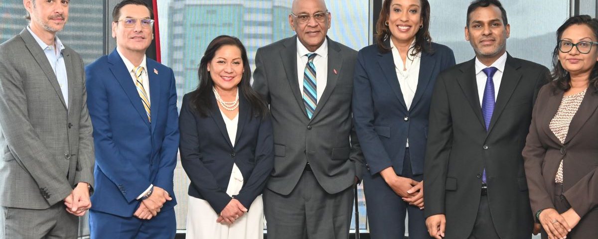 Group photo of Senator the Honourable Satyakama Maharaj, Minister of Trade, Investment and Tourism (centre), Dr. Colin Neil Gosine, Parliamentary Secretary in the Ministry (2nd from left), and Mr. Randall Karim, Permanent Secretary (Ag.) (2nd from right), along with members of the TTCIC, Ms. Sonji Pierre-Chase, President (3rd from right), Ms. Karen Yip Chuck, Senior Vice President (3rd from left), Dr. Christian Stone, Vice President (1st from left) and Ms. Vashti Guyadeen, Chief Executive Officer (1st from right)