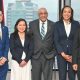 Group photo of Senator the Honourable Satyakama Maharaj, Minister of Trade, Investment and Tourism (centre), Dr. Colin Neil Gosine, Parliamentary Secretary in the Ministry (2nd from left), and Mr. Randall Karim, Permanent Secretary (Ag.) (2nd from right), along with members of the TTCIC, Ms. Sonji Pierre-Chase, President (3rd from right), Ms. Karen Yip Chuck, Senior Vice President (3rd from left), Dr. Christian Stone, Vice President (1st from left) and Ms. Vashti Guyadeen, Chief Executive Officer (1st from right)