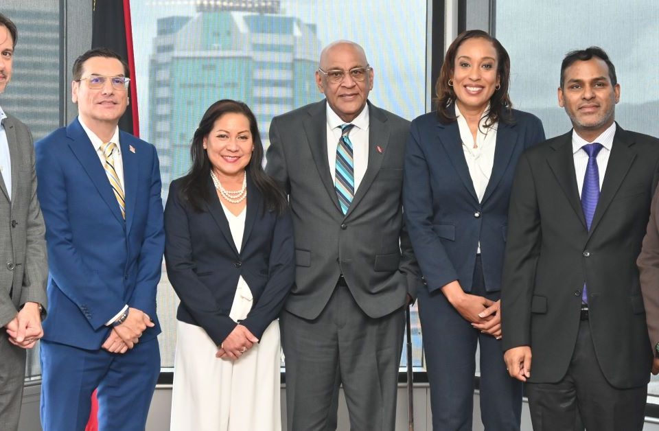 Group photo of Senator the Honourable Satyakama Maharaj, Minister of Trade, Investment and Tourism (centre), Dr. Colin Neil Gosine, Parliamentary Secretary in the Ministry (2nd from left), and Mr. Randall Karim, Permanent Secretary (Ag.) (2nd from right), along with members of the TTCIC, Ms. Sonji Pierre-Chase, President (3rd from right), Ms. Karen Yip Chuck, Senior Vice President (3rd from left), Dr. Christian Stone, Vice President (1st from left) and Ms. Vashti Guyadeen, Chief Executive Officer (1st from right)