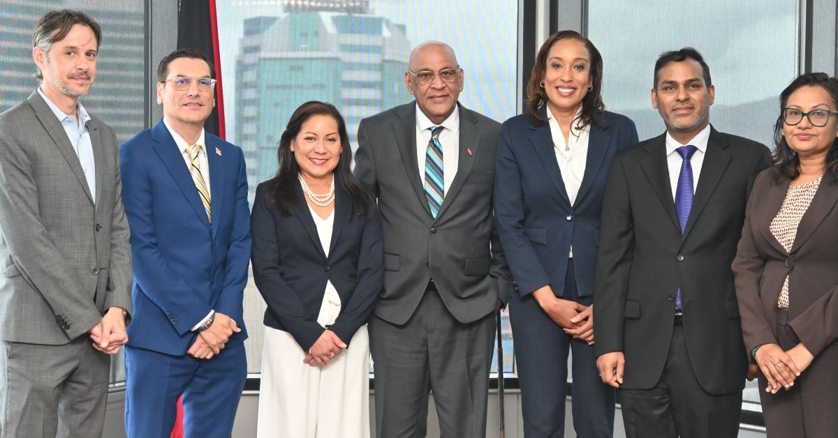 Group photo of Senator the Honourable Satyakama Maharaj, Minister of Trade, Investment and Tourism (centre), Dr. Colin Neil Gosine, Parliamentary Secretary in the Ministry (2nd from left), and Mr. Randall Karim, Permanent Secretary (Ag.) (2nd from right), along with members of the TTCIC, Ms. Sonji Pierre-Chase, President (3rd from right), Ms. Karen Yip Chuck, Senior Vice President (3rd from left), Dr. Christian Stone, Vice President (1st from left) and Ms. Vashti Guyadeen, Chief Executive Officer (1st from right)