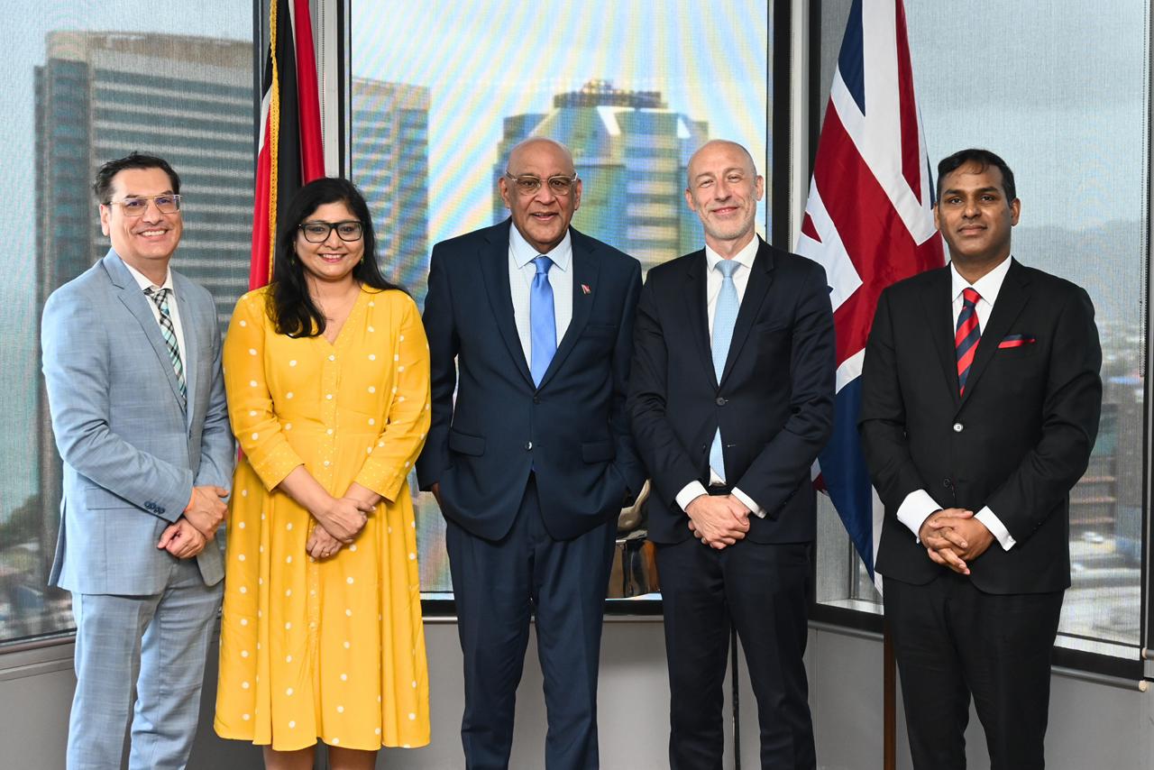 Senator the Honourable Satyakama Maharaj, Minister of Trade, Investment and Tourism (centre), with His Excellency Jon Dean, High Commissioner for the United Kingdom of Great Britain and Northern Ireland to the Republic of Trinidad and Tobago (2nd from right), Ms. Chinali Patel, Head of Political, Economic and Press Affairs at the High Commission (2nd from left), Dr. Colin Neil Gosine, Parliamentary Secretary in the Ministry (1st from left), and Mr. Randall Karim, Permanent Secretary (Ag.) (1st from right), following today’s meeting at the Ministry’s headquarters.
