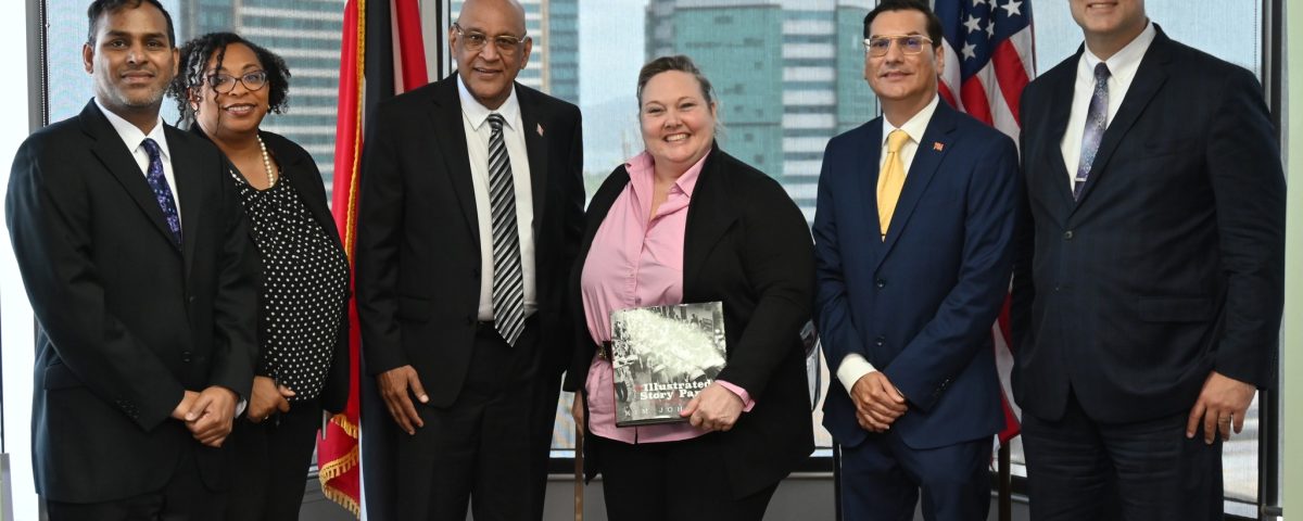 Senator the Honourable Satyakama Maharaj, Minister of Trade, Investment and Tourism (centre left), with Dr. Jenifer Neidhart de Ortiz, Chargé d’Affaires at the Embassy of the United States of America in Port of Spain (centre right). Also present are Dr. Colin Neil Gosine, Parliamentary Secretary in the Ministry (second from right), Mr Randall Karim, Permanent Secretary in the Ministry (left), and other members of the visiting delegation.