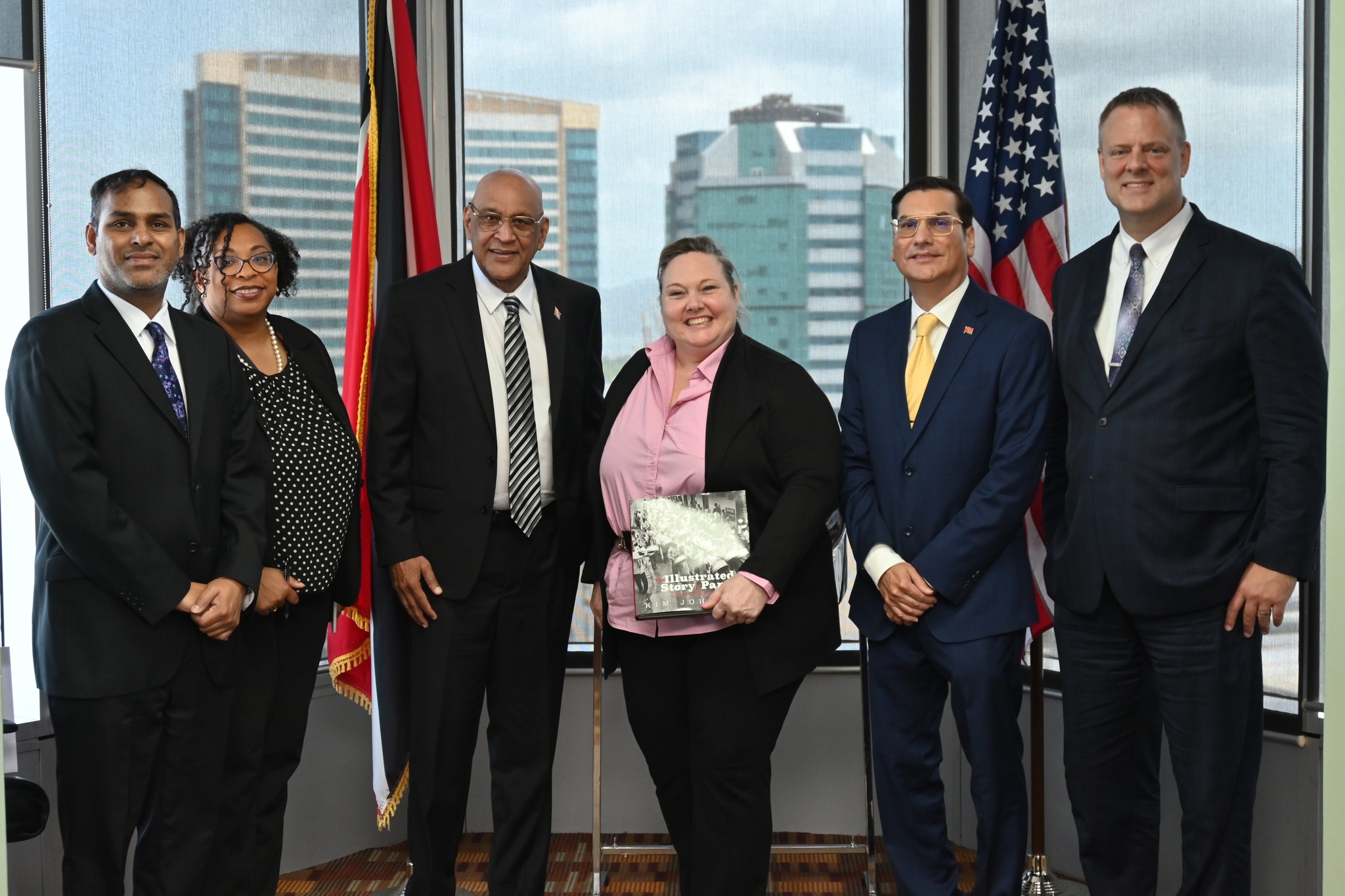 Senator the Honourable Satyakama Maharaj, Minister of Trade, Investment and Tourism (centre left), with Dr. Jenifer Neidhart de Ortiz, Chargé d’Affaires at the Embassy of the United States of America in Port of Spain (centre right). Also present are Dr. Colin Neil Gosine, Parliamentary Secretary in the Ministry (second from right), Mr Randall Karim, Permanent Secretary in the Ministry (left), and other members of the visiting delegation.