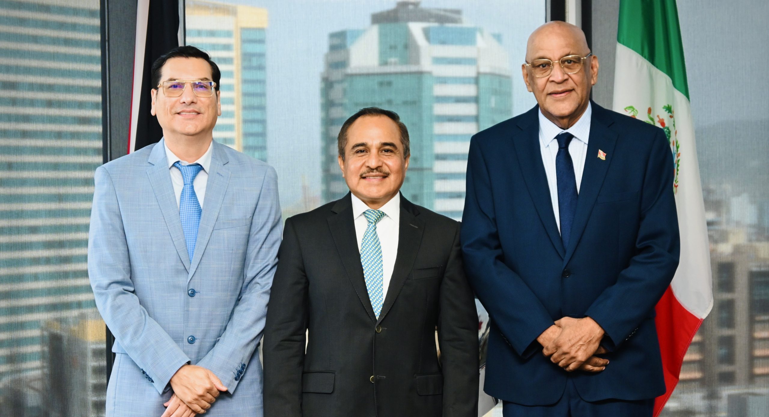 Senator the Honourable Satyakama Maharaj, Minister of Trade, Investment and Tourism (right) and Dr. Neil Gosine MP, Parliamentary Secretary (right) with His Excellency Victor Hugo Melendez, Ambassador of Mexico (Centre)