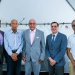 Group of of men including Senator the Honourable Satyakama Maharaj, Minister of Trade, Investment and Tourism (center) together with Dr. Colin Neil Gosine, MP, Parliamentary Secretary in the Ministry of Trade, Investment and Tourism (second from left), Mr. Anthony Pinto, Chairman of the Board of Directors, GC Resorts Ltd. (left), Mr. Ken Gordon, GC Resorts Advisor, and Dr. Kirk Meighoo, GC Resorts Director.