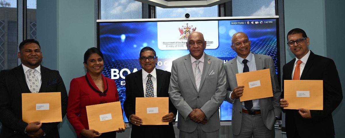 Senator the Honourable Satyakama Maharaj, Minister of Trade, Investment and Tourism (third from right); Mr. Edwin Chariah, EXIMBANK Chairman (third from left); Mr. Suresh Maharaj, Deputy Chairman (second from right); Ms. Nandini Narine, Director (second from left); Dr. Bhushan Singh, Director (right); and Mr. Joseph Ridge Paul, Director (left).