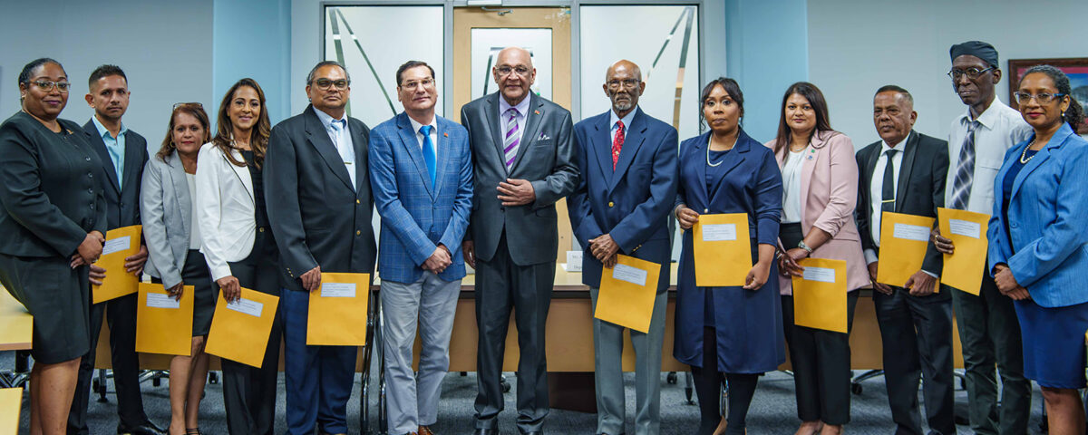 Group photo of the Board of Directors of TTBS with Minister, Parliamentary Secretary and Permanent Secretary