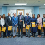 MTTi June- August Group photo of the Board of Directors of TTBS with Minister, Parliamentary Secretary and Permanent Secretary