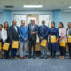 Group photo of the Board of Directors of TTBS with Minister, Parliamentary Secretary and Permanent Secretary
